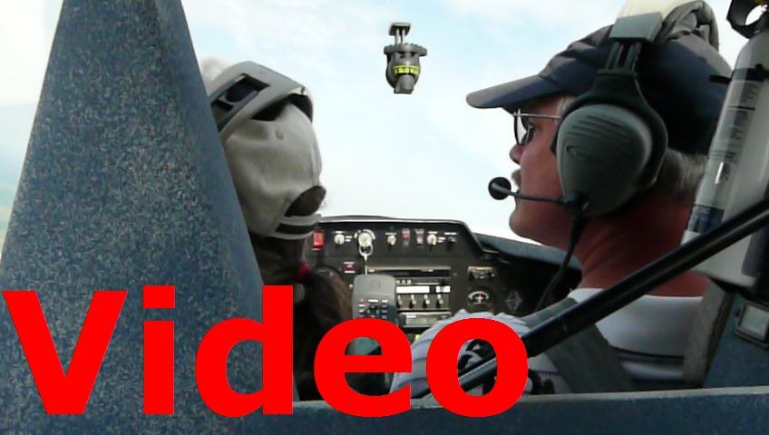 P1000232 Demo flight in Marc Zeitlin's Cozy Mark IV (N83MZ) - Coming up on UNU (Dodge County Airport)
