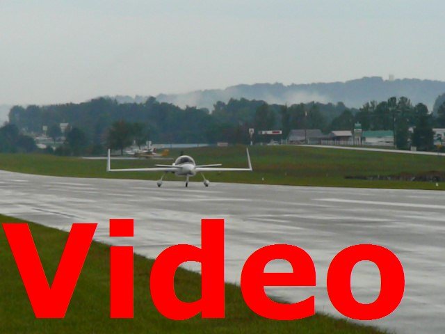 P1000592 Steve Wright's Stagger-EZ (N909EZ) taxiing back at the Rough River fly-in