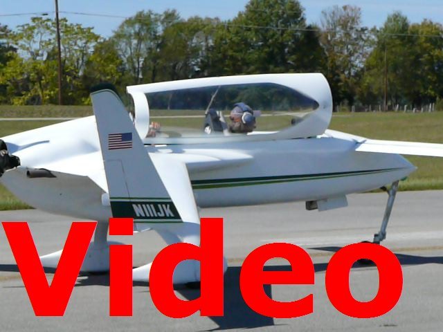 P1030215 Curt Boyll (N111JK) taxiing at Rough River